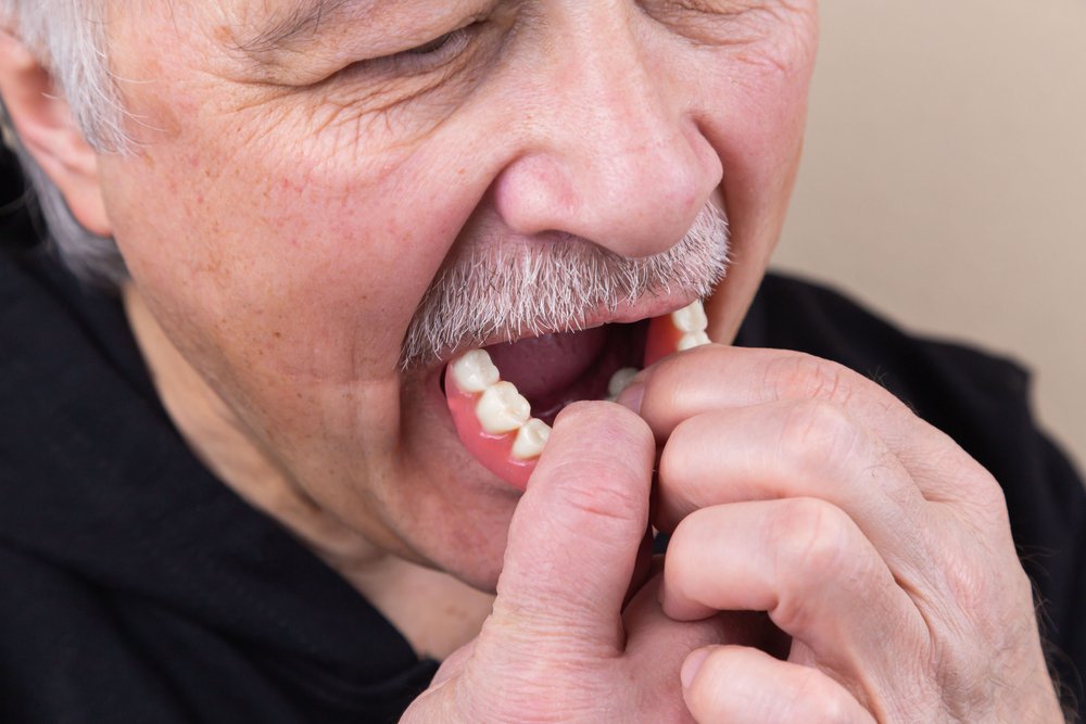 lower denture problems and solutions