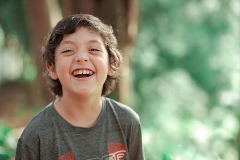 Smiling boy with a gap in his front teeth